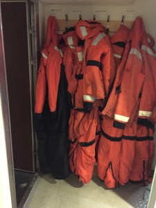 Crew's all-weather suits keep them warm and dry